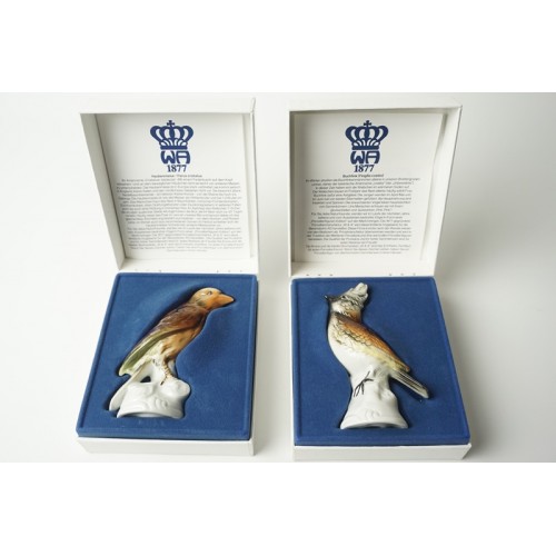 2 beeldjes van vogels in doosje met certificaat